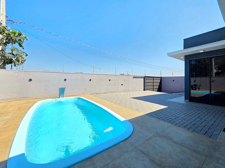 Casa novíssima com piscina ao lado do Centro